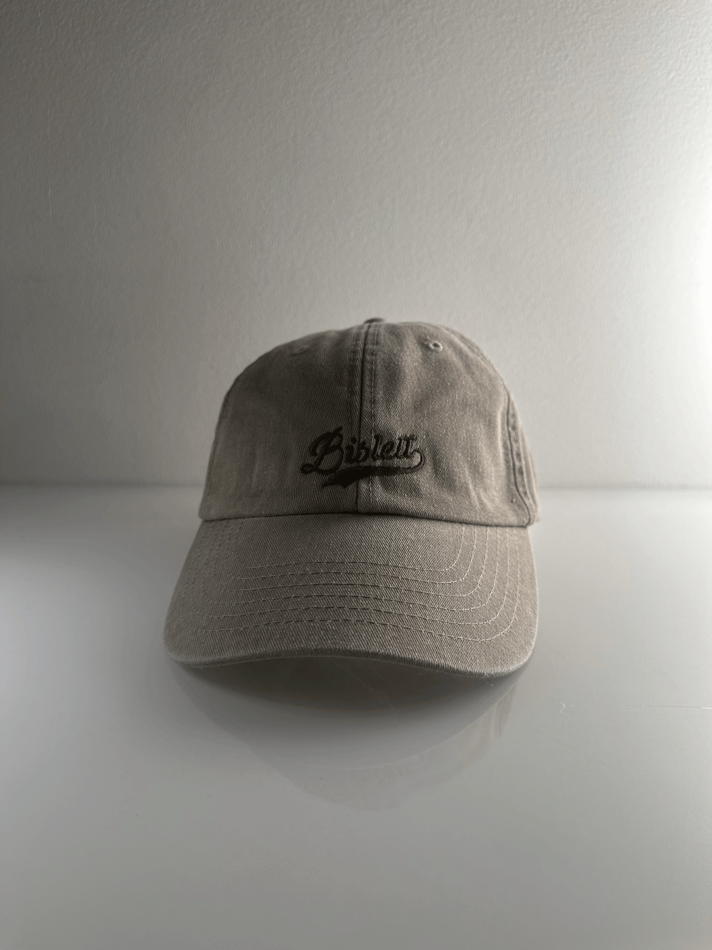 Caps - Stone med Bislett